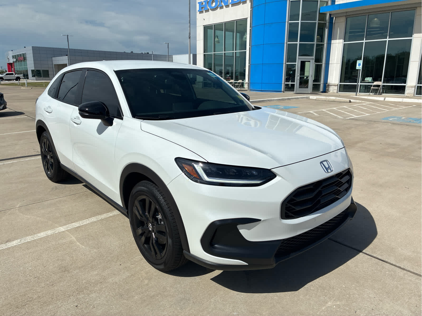 2027 Honda HR-V Sport in Platinum White Pearl — front three-quarter view