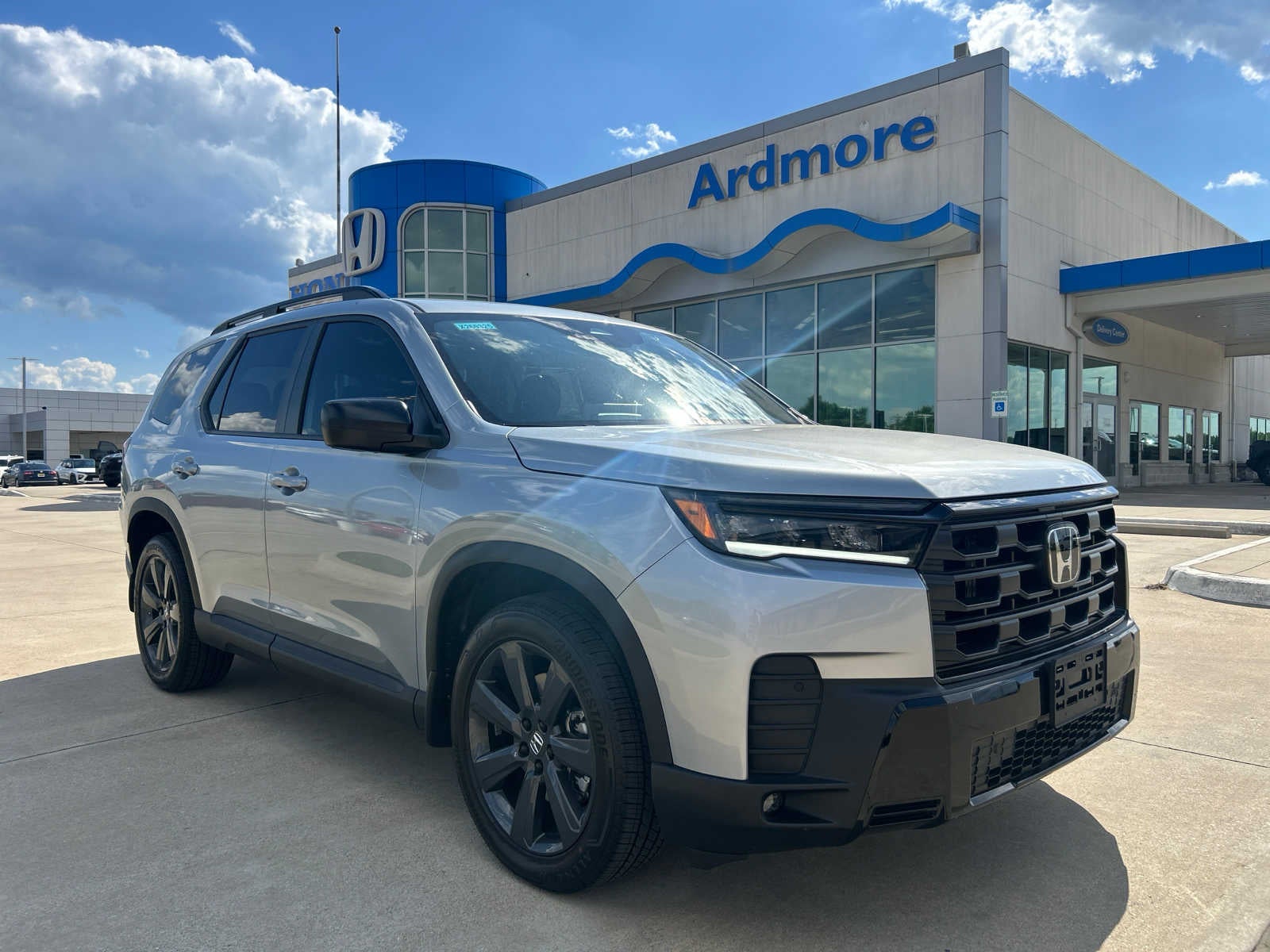 2026 Honda Pilot Sport in Solar Silver Metallic — front three-quarter view