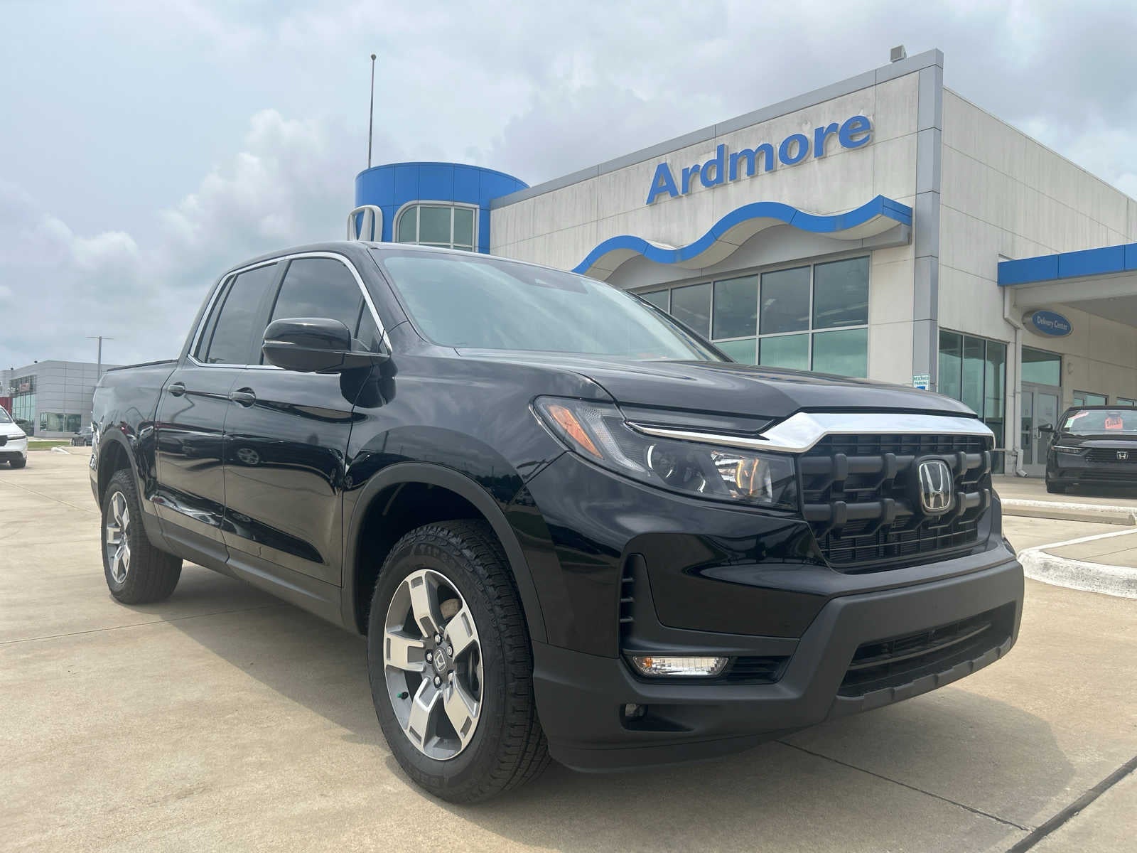 2026 Honda Ridgeline RTL in Crystal Black Pearl — front three-quarter view